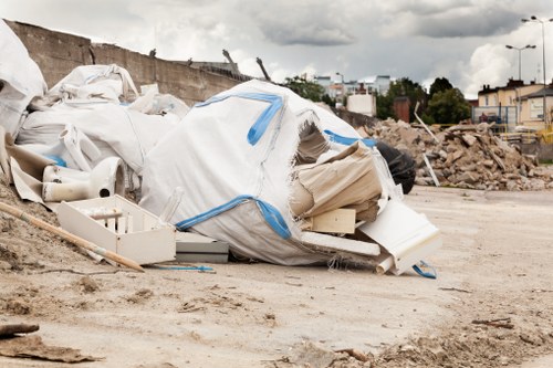 Professionals handling valuable items during house clearance